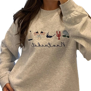 Heather gray Nantucket embroidered sweatshirt with sailboat, lobster, hydrangeas and island icons